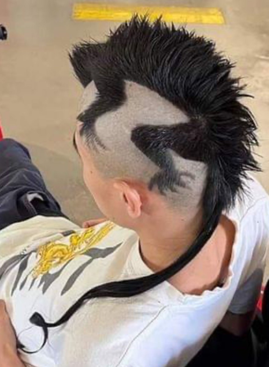 Coupe homme rasé côtés long dessus