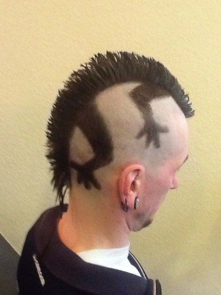 Coupe homme rasé côtés long dessus